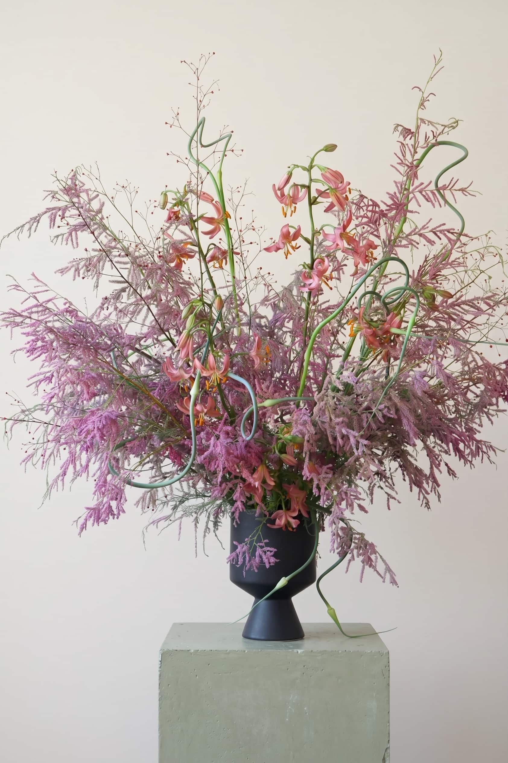 Floral arrangement with pink lilies