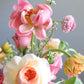 Beautiful Mother's Day bouquet from Shaa.Project, featuring vibrant coral flowers, arranged for same-day delivery in Denver.