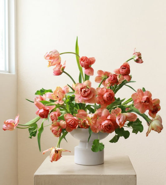 Bouquet of tulips in a white vase, fresh flower delivery in Denver 