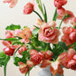 Bouquet of pink and peach fresh tulips in a vase for mother's day flower delivery 