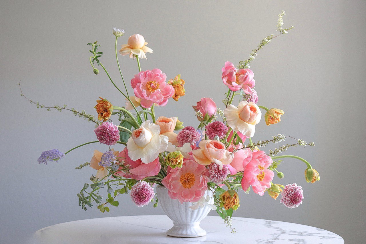 Romantic floral arrangement featuring colorful flowers by Shaa.Project, perfect for gifting or home decor, with free flower delivery.