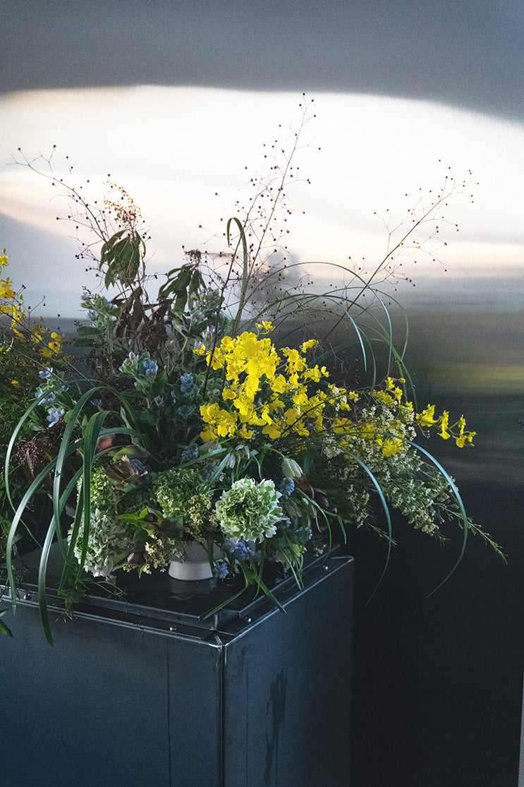 Shaa.Project Designer's Choice floral arrangement with vibrant blooms in an elegant vase, showcasing diverse colors and textures. Denver and Boulder florist