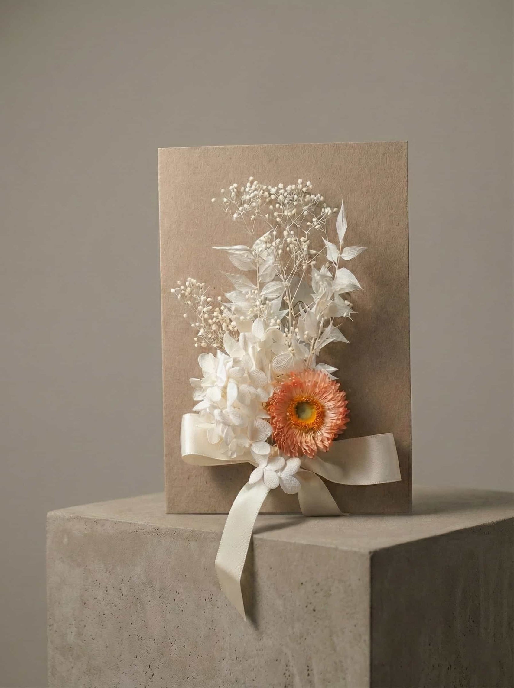 handmade message card with dried flowers and ribbon detail