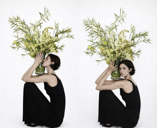 Olive minimalist green flower arrangement with sculptural stems and fresh greenery