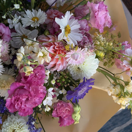 huge and fluffy bouquet of seasonal flowers