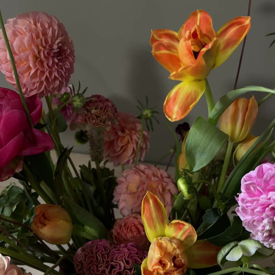 Romantic garden style arrangement with dahlia, peonies showing on the video 