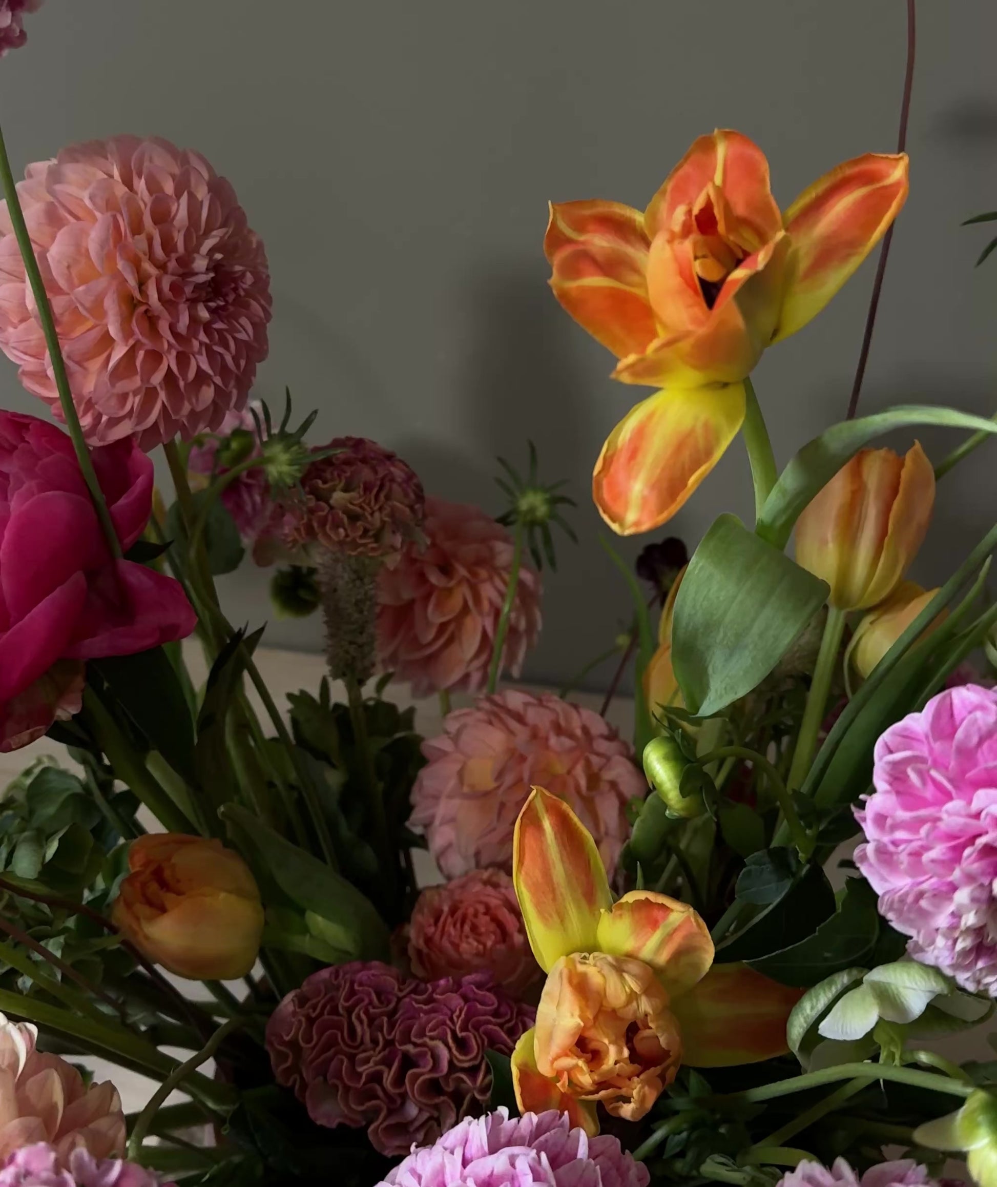 Romantic garden style arrangement with dahlia, peonies showing on the video 