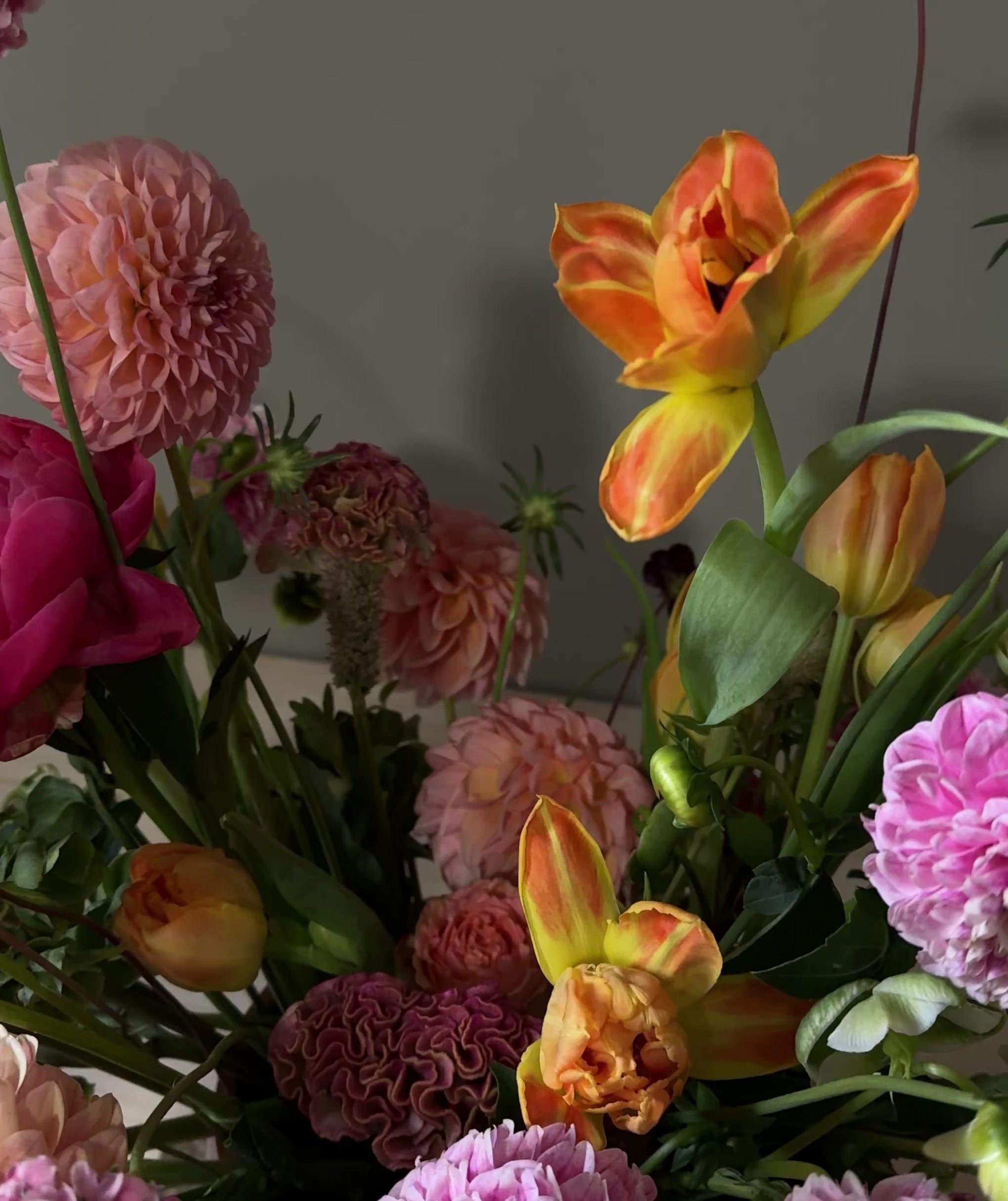 Romantic garden style arrangement with dahlia, peonies showing on the video 