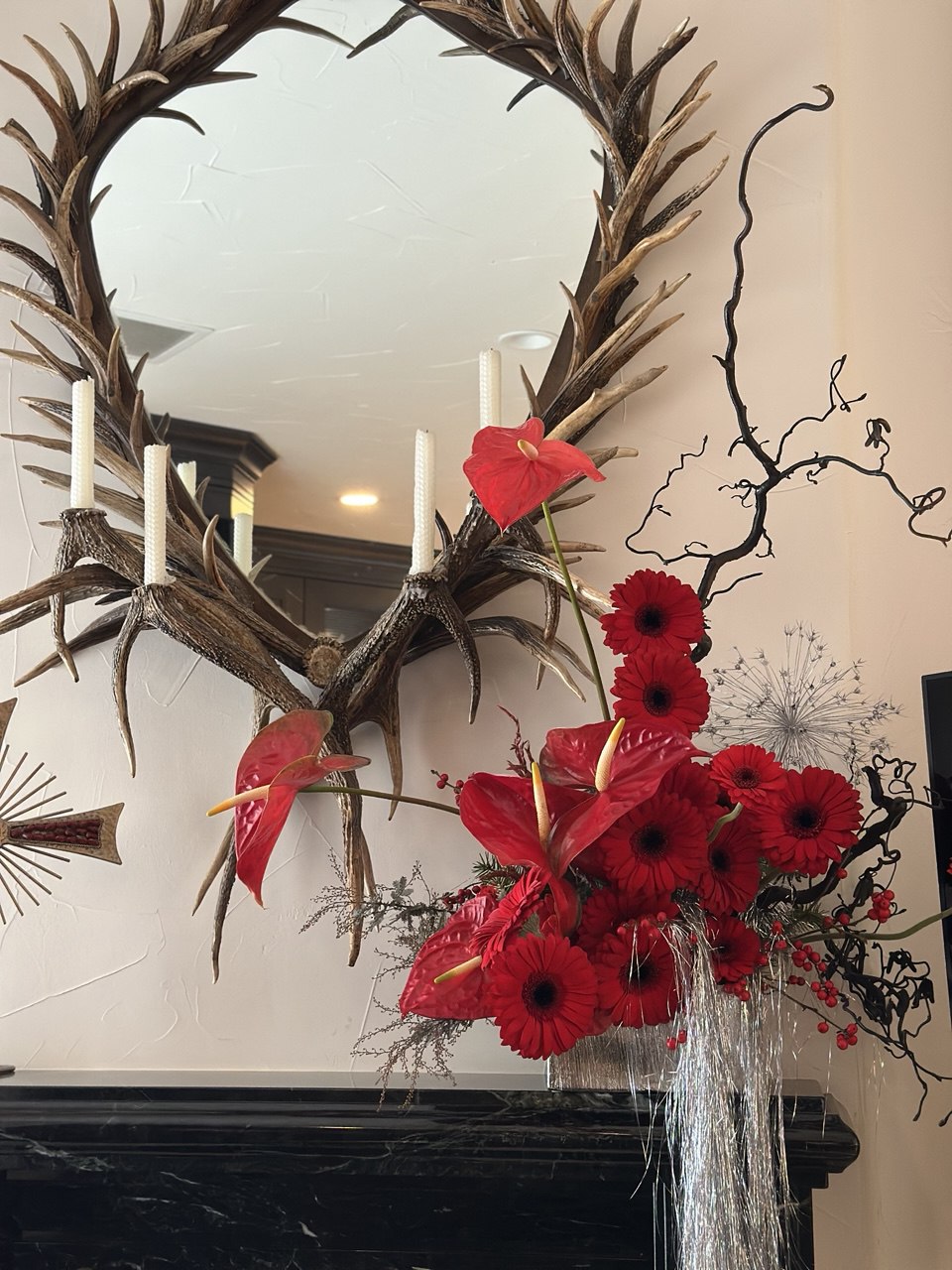 Red Noir sculptural red flower arrangement with anthuriums and dramatic branches by Shaa.Project