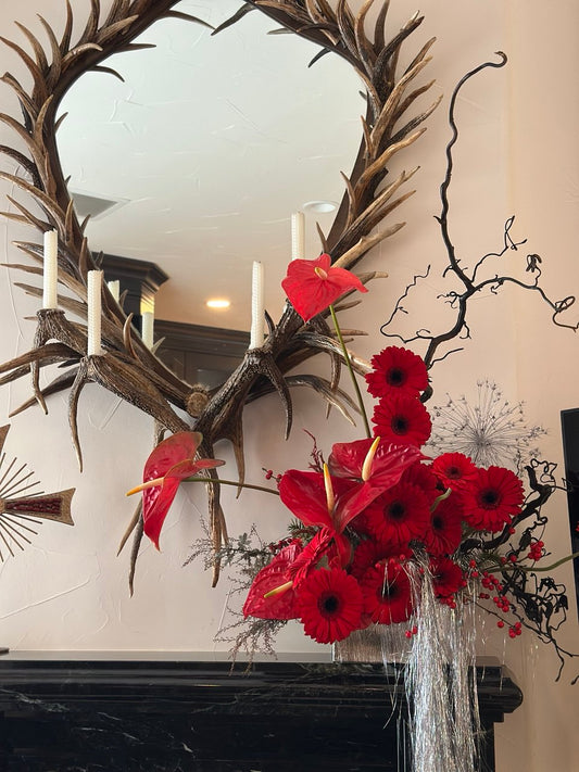 Red Noir sculptural red flower arrangement with anthuriums and dramatic branches by Shaa.Project