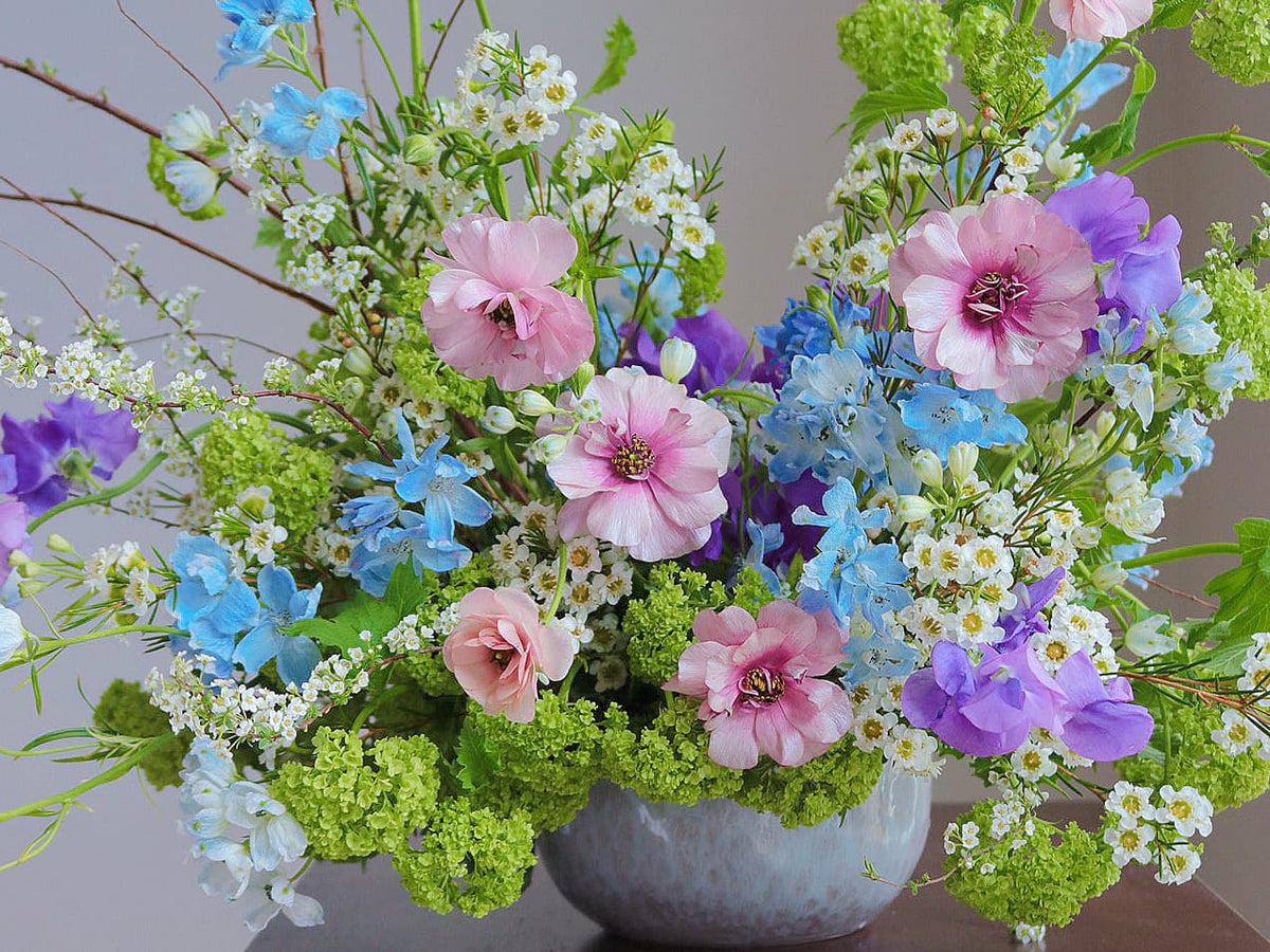 Colorful summer morning flowers in a vibrant arrangement by Shaa.Project.