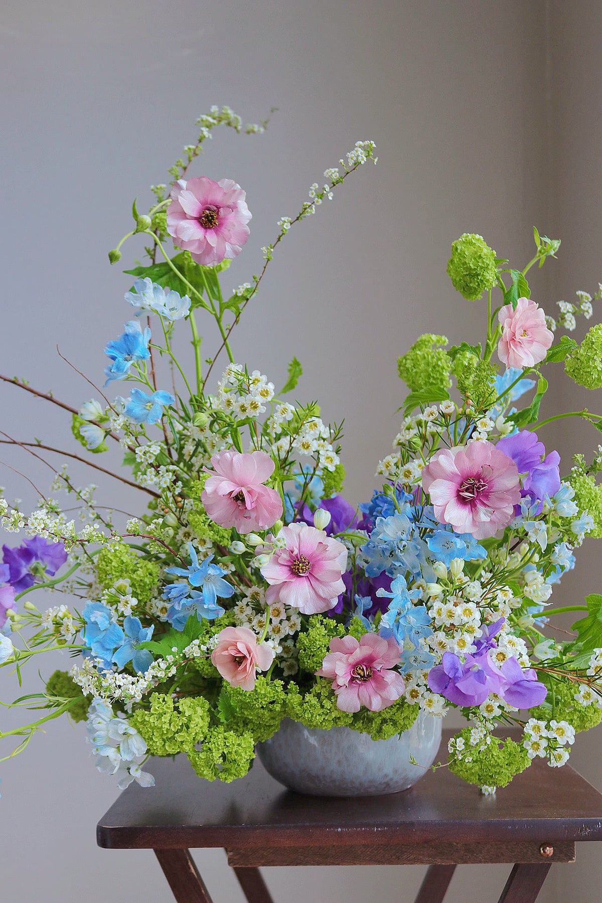 Vibrant summer morning flowers in a colorful arrangement by Shaa.Project, showcasing fresh blooms and greenery.