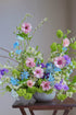 Vibrant summer morning flowers in a colorful arrangement by Shaa.Project, showcasing fresh blooms and greenery.