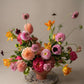Romantic colorful flower arrangement with dahlias and tulips for anniversary celebration