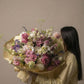 Pastel bouquet arrangement by Shaa.Project featuring soft colors and delicate floral textures.